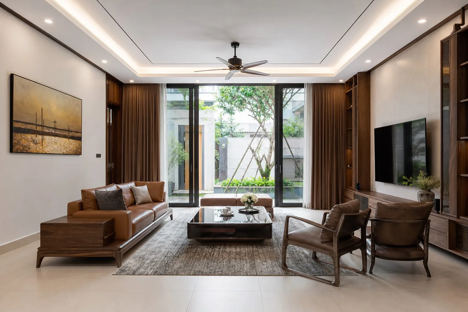 Phòng khách sau khi bố trí lại sofa và ghế đơn